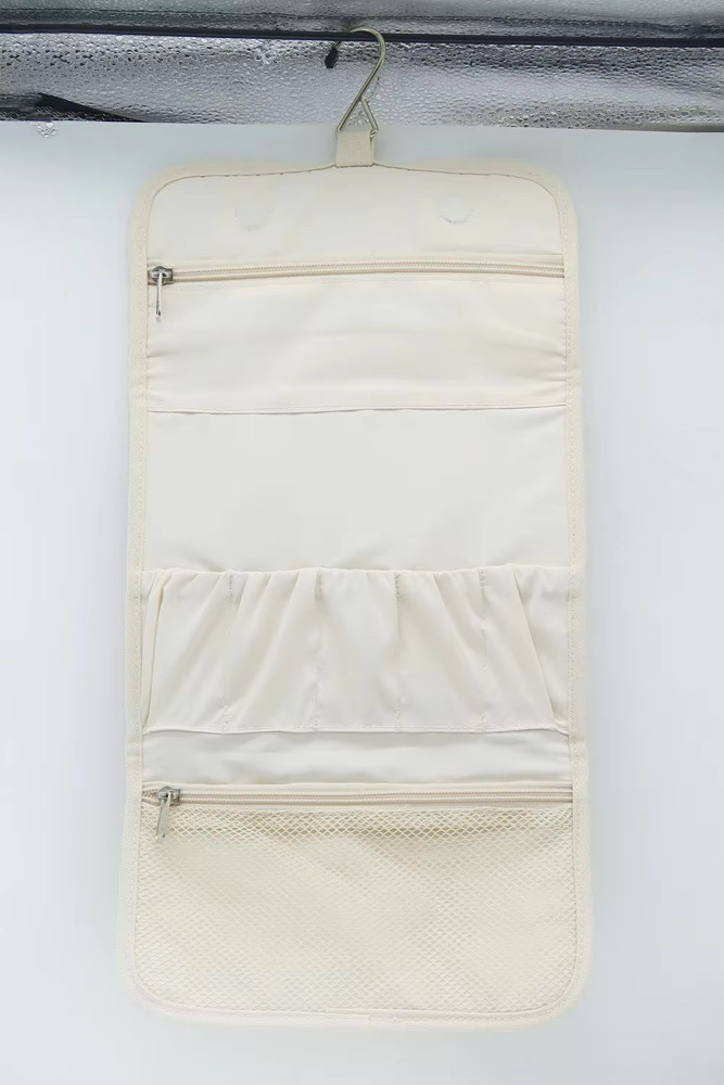 First manufactured sample of the VESSEL travel system, fully opened and hanging from its integrated hook